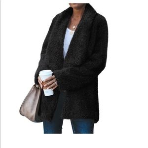 NWT sealed black fuzzy jacket